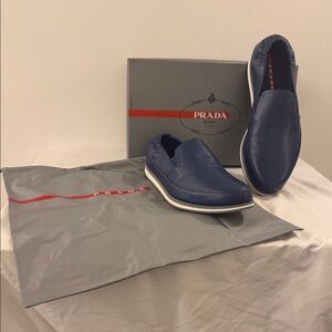 Prada Men's Navy Slip-On Loafers. New with box. Size 11-12 men’s.